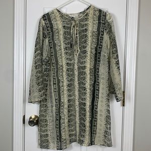 CAbi black and cream colored sheer tunic top size medium. 3/4 sleeves.